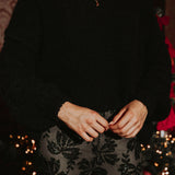 WINTER VIBES BLACK SWEATER