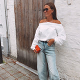 VIXIE WHITE SWEATER WITH A BUILT-IN NECKLACE