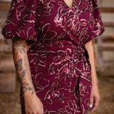 WYNDI BURGUNDY SEQUIN FLOWER WRAP DRESS