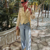 SOL DORADO LIGHT YELLOW WRAP BLOUSE