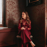 PARTY FEVER BORDEAUX PLISSE SEQUIN BLOUSE