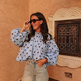 PARADISE LIGHT BLUE POLKADOTS OPEN BACK BLOUSE