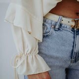 FAELINA ECRU RUFFLE BLOUSE