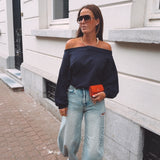 VIXIE DARK BLUE SWEATER WITH A BUILT-IN NECKLACE