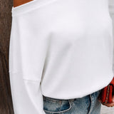 VIXIE WHITE SWEATER WITH A BUILT-IN NECKLACE