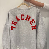 SWEATER TEACHER RED